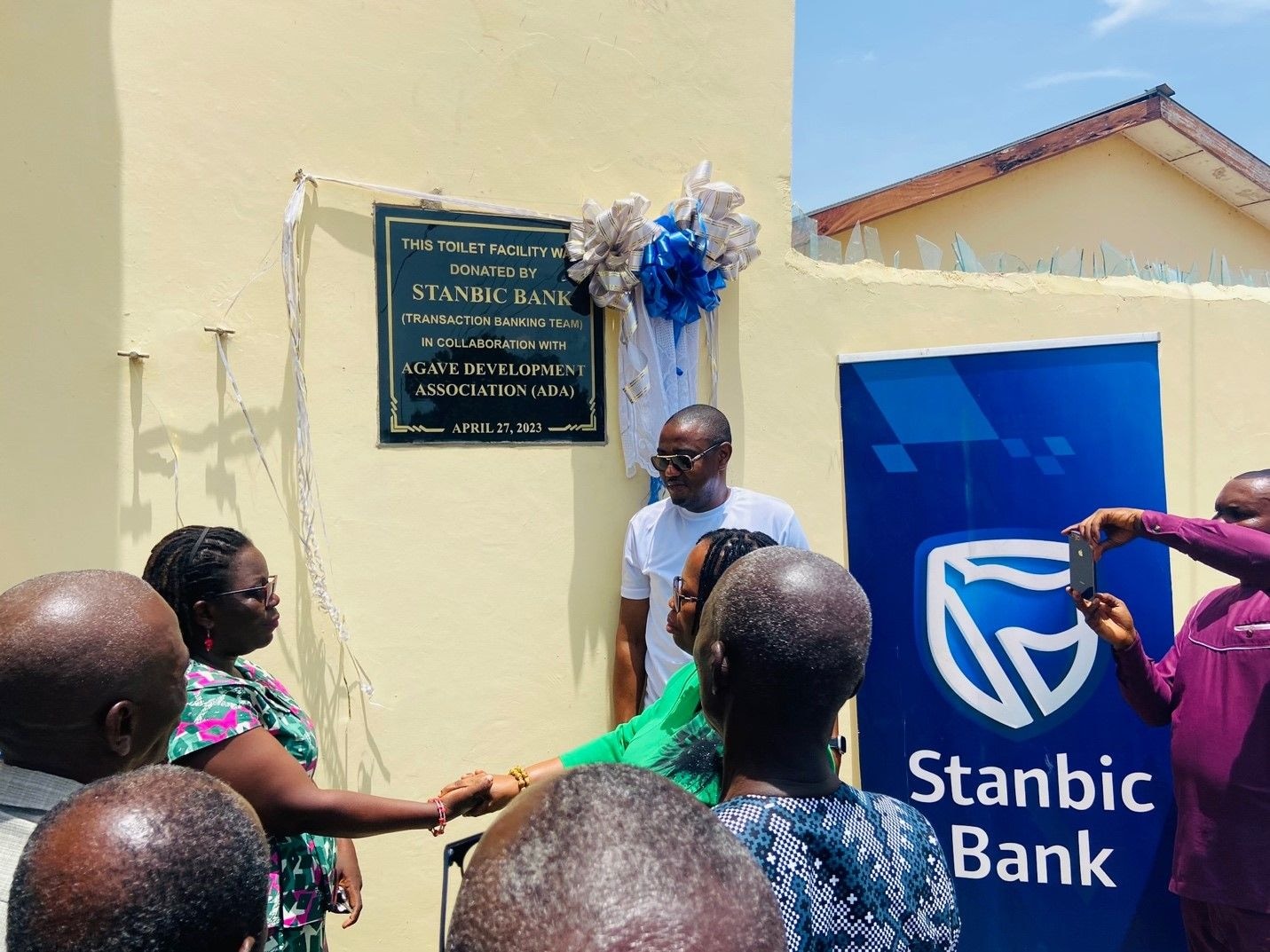 Stanbic employees inaugurate 10-seater toilet facility at Dabala